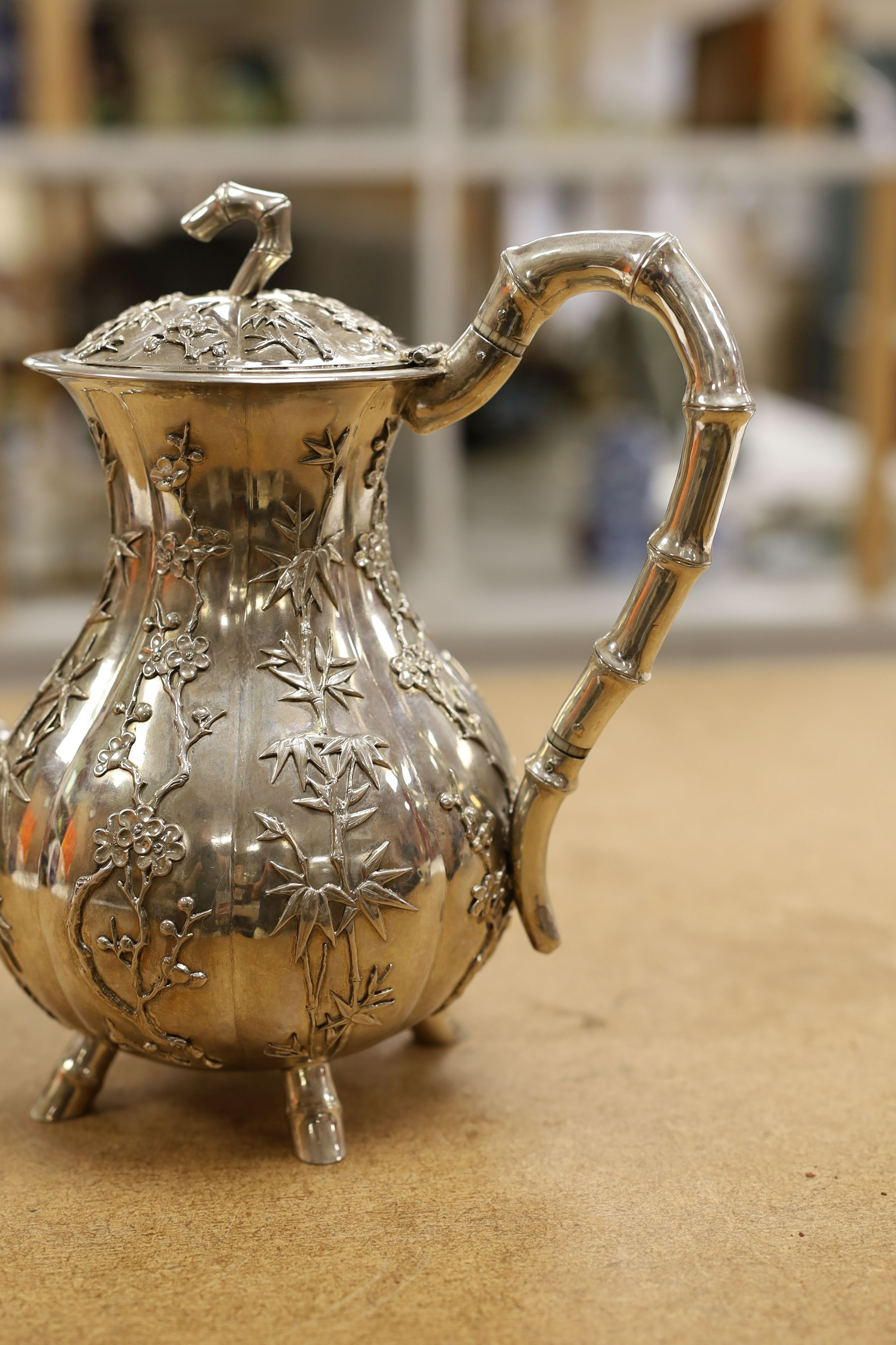 A late 19th/early 20th century Chinese Export white metal coffee pot by Hung Chong, height 20.3cm, gross weight 23.5oz.
